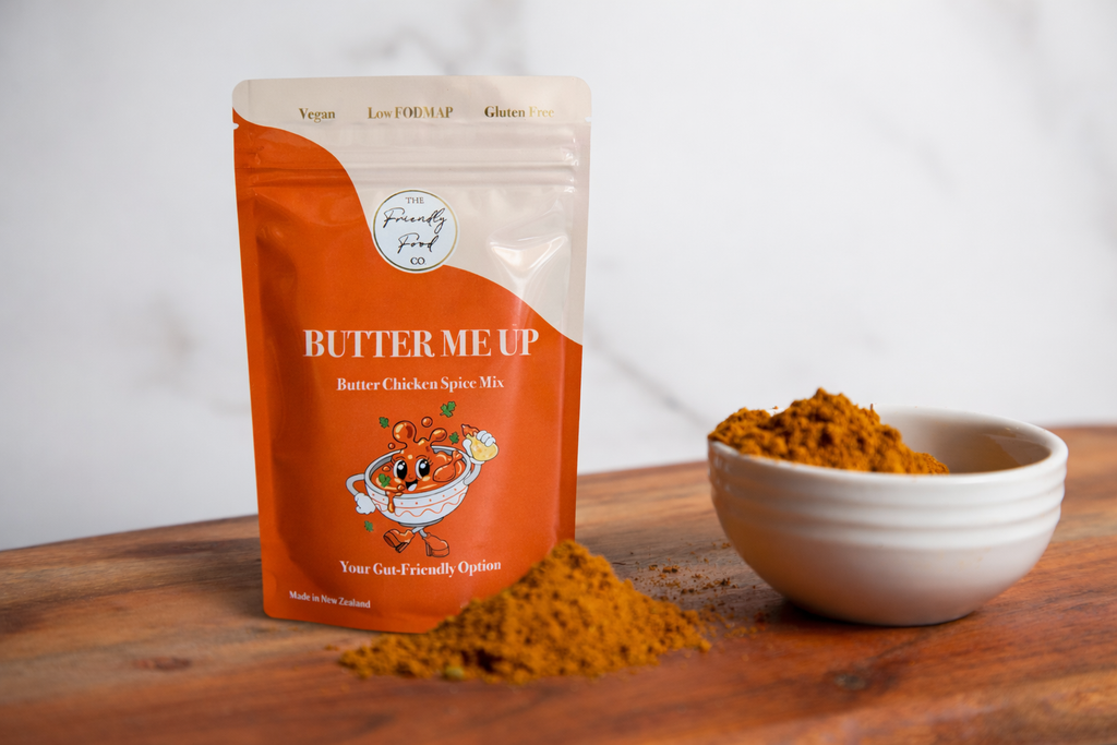 Butter Me Up - Low FODMAP Butter Chicken Spice Mix packet next to a ramekin of spice 