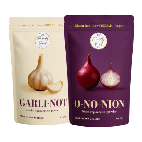 Two packages of garlic and onion replacement powders from The Friendly Food Co on a white background.